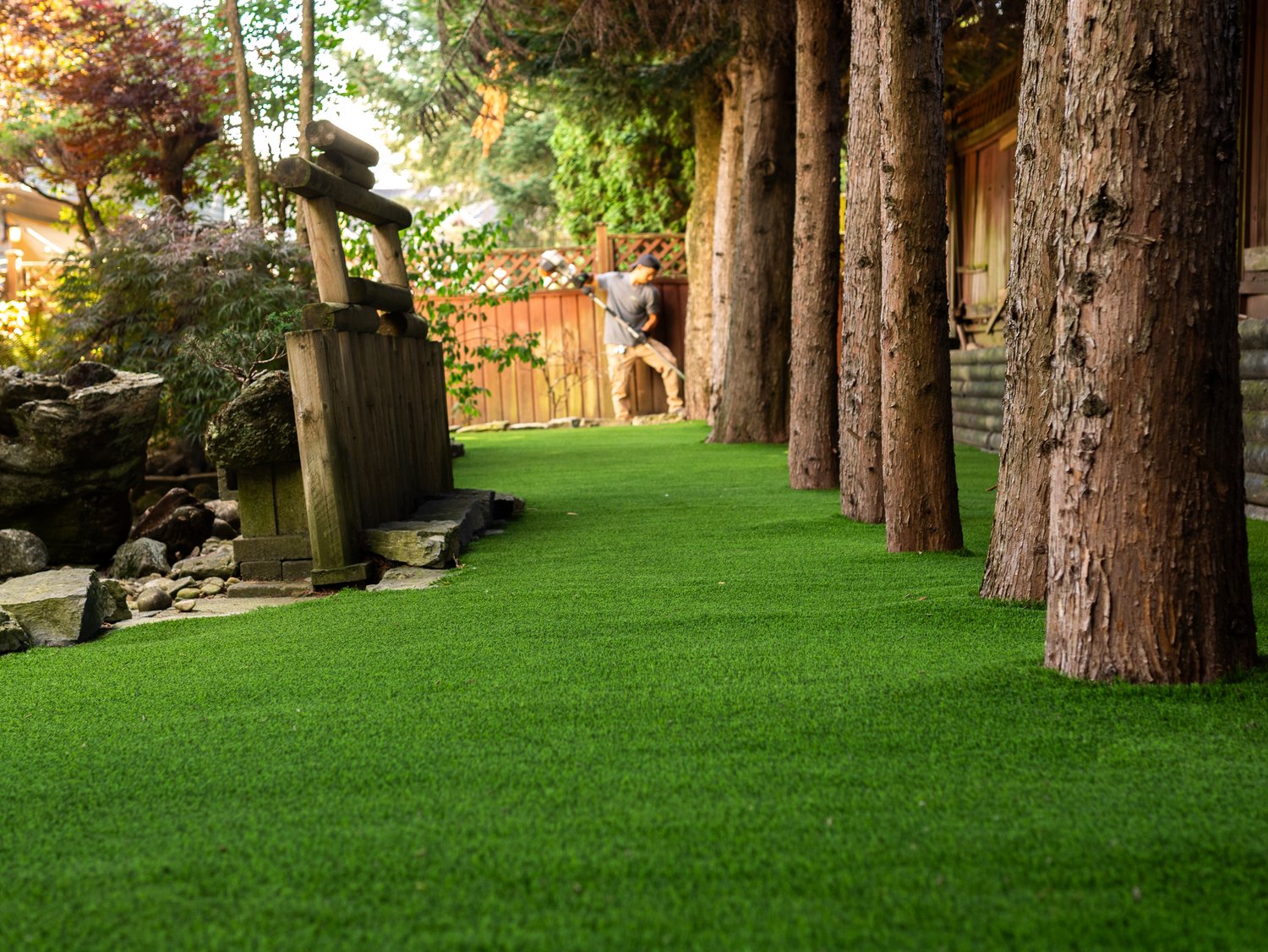 How Artificial Grass Installers Handle Drainage Issues